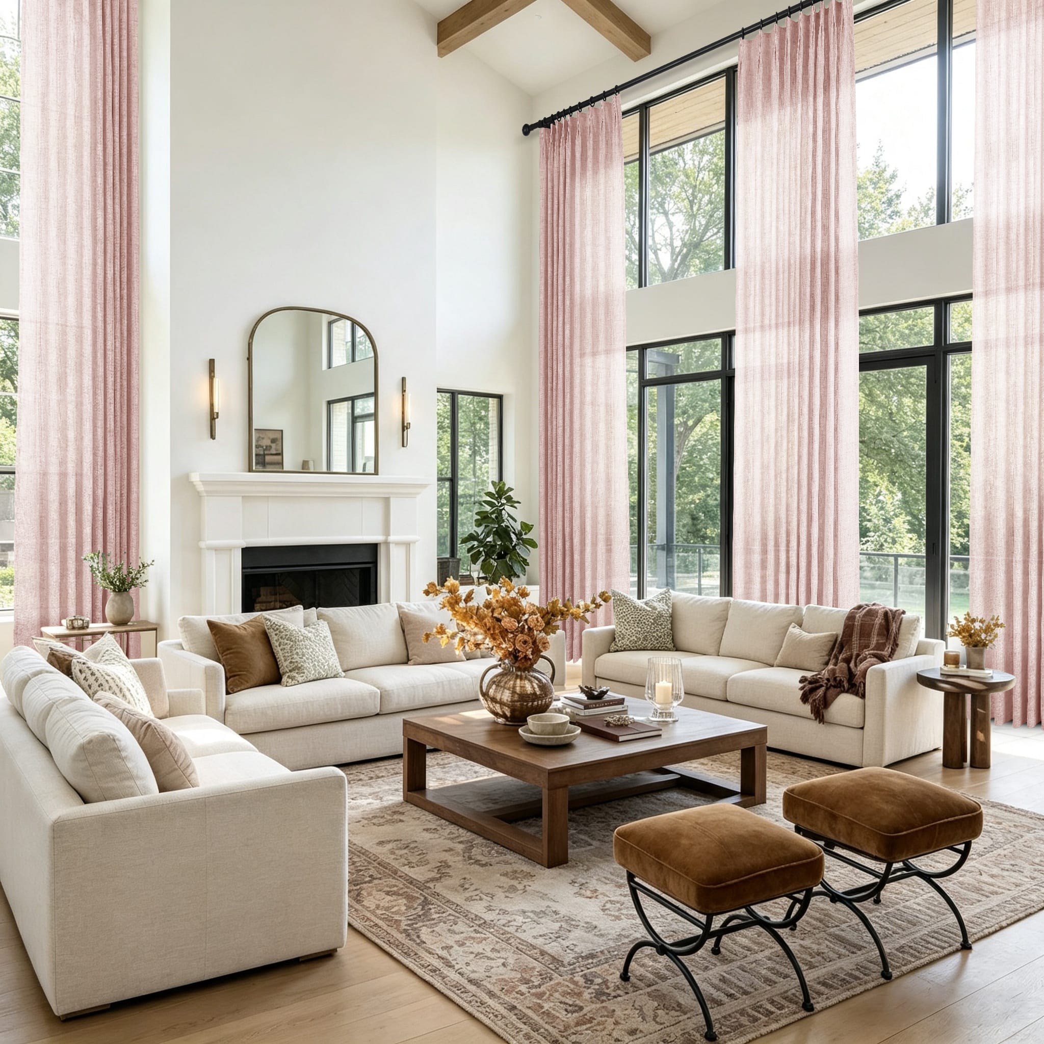 A bright modern living room with tall pink curtains and a large patterned area rug shown in a staged interior scene