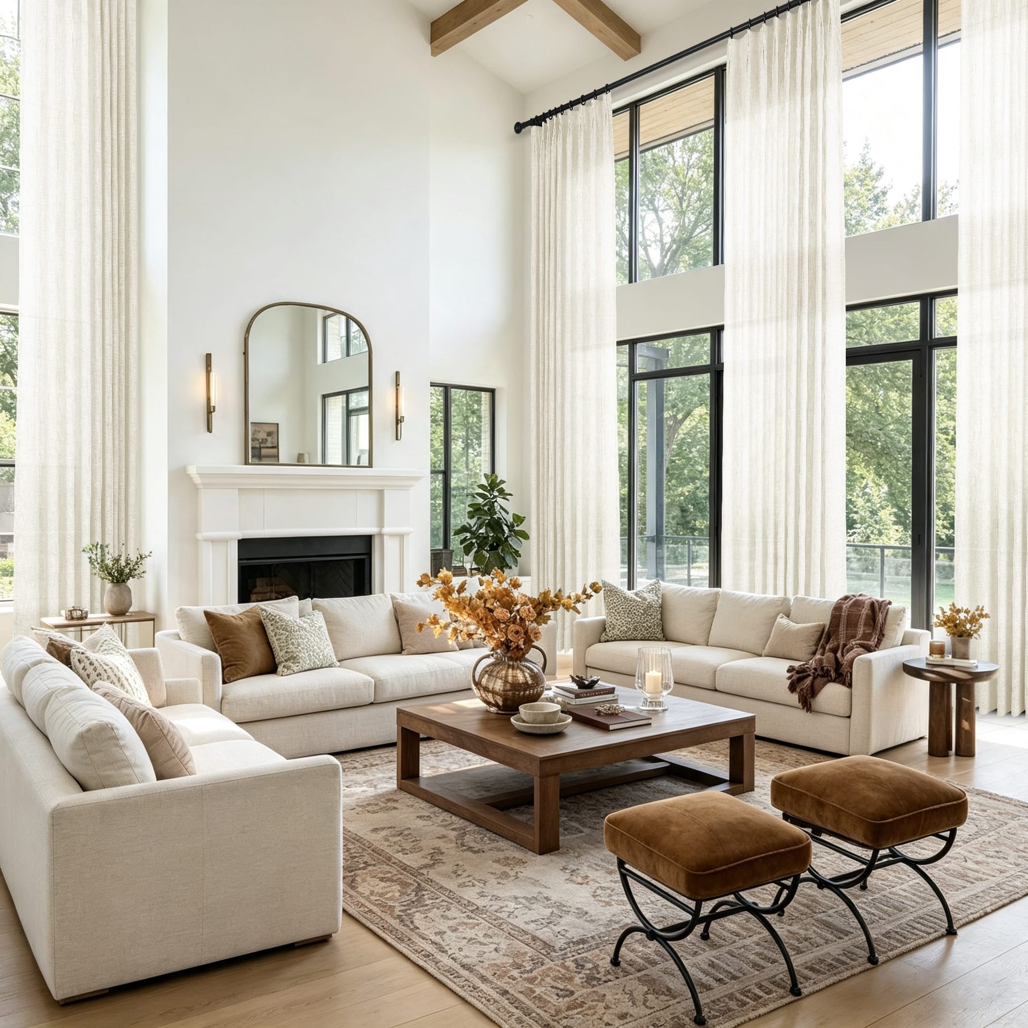 A bright modern living room featuring sheer white curtains