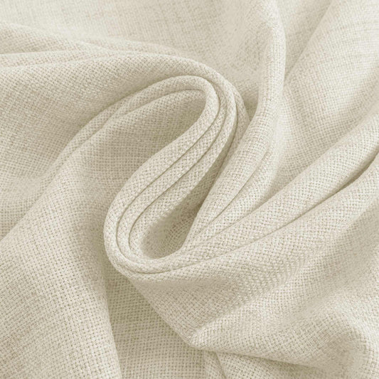 Close-up of beige fabric with a textured pattern